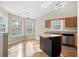 Open kitchen with granite countertops, stainless steel appliances, a center island, and an adjacent dining area at 4659 East Walkerton Rd., Myrtle Beach, SC 29579