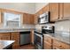 Close up of a kitchen featuring granite countertops, stainless steel appliances, and ample storage at 4659 East Walkerton Rd., Myrtle Beach, SC 29579