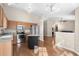 An open view to living room from kitchen, with hardwood floors, ceiling fan, and an open floor plan at 4659 East Walkerton Rd., Myrtle Beach, SC 29579