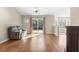 Relaxing living room offering hardwood floors, sliding glass doors leading to a backyard view at 4659 East Walkerton Rd., Myrtle Beach, SC 29579