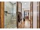 Modern bathroom with a glass shower, tile walls, and a walk-in toliet at 7299 Cartrette Rd., Aynor, SC 29511