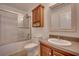 Bathroom with a shower-tub combo, vanity, and a mirror at 121 Grand Palm Ct., Myrtle Beach, SC 29579
