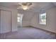 Bedroom with a ceiling fan and multiple windows at 121 Grand Palm Ct., Myrtle Beach, SC 29579
