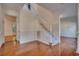 Bright foyer with hardwood floors, staircase, and detailed trim work at 121 Grand Palm Ct., Myrtle Beach, SC 29579