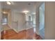 Hallway featuring hardwood floors and white trim at 121 Grand Palm Ct., Myrtle Beach, SC 29579