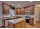 Stylish kitchen featuring stainless steel appliances, center island, and granite countertops at 121 Grand Palm Ct., Myrtle Beach, SC 29579