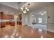 Open concept kitchen and living space featuring hardwood floors and recessed lighting at 121 Grand Palm Ct., Myrtle Beach, SC 29579