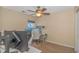 Bedroom with desk, computer setup, ceiling fan, and closet at 133 Junco Circle, Longs, SC 29568