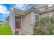 Home's welcoming entrance with a colorful floral wreath at 133 Junco Circle, Longs, SC 29568