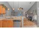 Kitchen bar overlooking an open living space features stainless steel appliances and sleek design at 133 Junco Circle, Longs, SC 29568