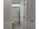 Bright bathroom with a toilet, tub and shower combination and a window for natural light at 2327 King Farm Rd., Aynor, SC 29511