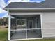Screened-in porch with view of backyard at 2327 King Farm Rd., Aynor, SC 29511