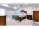 Serene bedroom featuring a luxurious bed, carpeted floors, and soft lighting at 2557 7B Pete Dye Dr. # 704, North Myrtle Beach, SC 29582