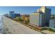 Beachfront condo complex with a sandy beach right outside, perfect for sunbathing and enjoying the ocean breeze at 1207 S Ocean Blvd. # 51408, Myrtle Beach, SC 29577
