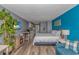 Cozy living area featuring a bed, TV, and a small kitchenette, perfect for relaxing after a day at the beach at 1207 S Ocean Blvd. # 51408, Myrtle Beach, SC 29577