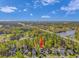 Aerial shot highlighting the property, nestled in a community with waterways, green spaces, and convenient bridge access at 136 Kenzgar Dr., Myrtle Beach, SC 29588