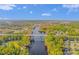 Panoramic aerial showcasing bridge, waterway, and lush greenery providing serene and picturesque natural views at 136 Kenzgar Dr., Myrtle Beach, SC 29588