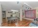 Finished basement area with a ping pong table, wood laminate flooring, and decorative lighting at 136 Kenzgar Dr., Myrtle Beach, SC 29588