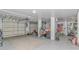 Spacious three car garage with painted floors and plenty of storage space throughout the entire area at 136 Kenzgar Dr., Myrtle Beach, SC 29588