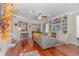 Cozy living room with hardwood floors, fireplace, built-in shelves, and comfortable seating at 136 Kenzgar Dr., Myrtle Beach, SC 29588