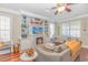 Relaxing living room featuring a fireplace with built-ins and comfortable seating area at 136 Kenzgar Dr., Myrtle Beach, SC 29588