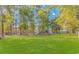 Inviting community playground with slides and play equipment nestled in a green space with mature trees at 136 Kenzgar Dr., Myrtle Beach, SC 29588