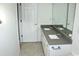 Bathroom with double vanity, gray quartz countertops and ample cabinet storage at 156 Weeping Willow Dr., Myrtle Beach, SC 29579