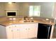 Spacious kitchen featuring a large breakfast bar and ample counter space at 156 Weeping Willow Dr., Myrtle Beach, SC 29579