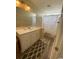 Bathroom with white vanity and shower/tub combo at 2268 Essex Dr. # G, Surfside Beach, SC 29575