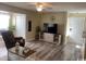 Living room with grey flooring and comfy seating at 2268 Essex Dr. # G, Surfside Beach, SC 29575