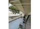 Outdoor patio area with chairs and a view of the pool area at 2805 N Ocean Blvd. # 107, Myrtle Beach, SC 29577
