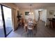 Dining room featuring natural lighting and access to the outdoor balcony at 2805 N Ocean Blvd. # 107, Myrtle Beach, SC 29577