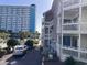 Condo with private balconies, parking, and ocean view in the distance at 2805 N Ocean Blvd. # 107, Myrtle Beach, SC 29577