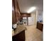 Classic kitchen featuring granite countertops and white appliances at 2805 N Ocean Blvd. # 107, Myrtle Beach, SC 29577