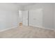 Bedroom featuring double door closet, neutral walls, and carpeted floors at 608 Britt St., Georgetown, SC 29440