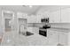 Well-equipped kitchen featuring granite counters, stainless appliances, and ample cabinet space at 608 Britt St., Georgetown, SC 29440
