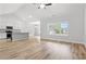 Bright and spacious living room with wood floors, high ceilings, and plentiful natural light at 608 Britt St., Georgetown, SC 29440