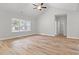Bright main bedroom with a large window, vaulted ceiling and hardwood floors at 608 Britt St., Georgetown, SC 29440