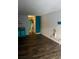 Open-concept living space with wood flooring, connecting living, dining, and kitchen areas at 1501 Ocean Blvd. S # 422, Myrtle Beach, SC 29577