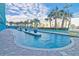 Relaxing lazy river with clear water, palm trees, and a bright blue sky backdrop at 1501 Ocean Blvd. S # 422, Myrtle Beach, SC 29577