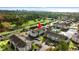 Community aerial view featuring complex, pool, pond with fountain, lush landscaping, and close proximity to the beach at 3735 Block House Way # 113, Myrtle Beach, SC 29577
