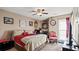 Bedroom featuring cozy bed, neutral walls, and plenty of decor, perfect for relaxation and rest at 3735 Block House Way # 113, Myrtle Beach, SC 29577