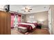 Inviting bedroom features a comfortable bed, soft lighting, and a window with views of the outdoors at 3735 Block House Way # 113, Myrtle Beach, SC 29577