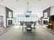 Spacious clubhouse interior featuring fireplaces, large windows, seating and a dining table at 3735 Block House Way # 113, Myrtle Beach, SC 29577