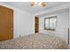 Neutral bedroom features a ceiling fan, window, closet and a dresser at 6001 - 1789 S Kings Hwy., Myrtle Beach, SC 29575