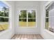 Cozy room offering lots of natural light from the three big windows and hardwood floors at 8001 Mcsweeney Ct., Myrtle Beach, SC 29588