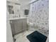 Bathroom featuring modern fixtures, a tile floor, and stylish decor and a shower at 8830 Chandler Dr. # G, Surfside Beach, SC 29575
