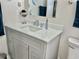 Modern bathroom featuring a gray vanity with a white countertop and contemporary faucet at 8830 Chandler Dr. # G, Surfside Beach, SC 29575