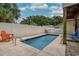 Inviting pool area featuring a refreshing swimming pool, surrounded by a white fence and comfortable seating at 118A 6Th Ave. N, Surfside Beach, SC 29575