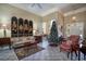 Inviting living room with a decorative screen, comfortable seating, and a cozy ambiance at 1716 Club Circle Dr., Pawleys Island, SC 29585